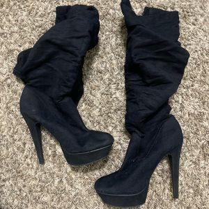 Knee high heel boots